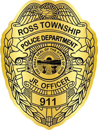 A gold County Police Department Junior Officer badge sticker with black text  - Law Enforcement