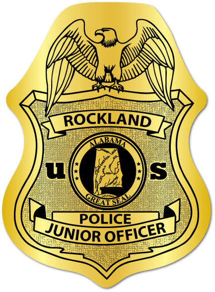 Gold police badge with Police Junior Officer text  